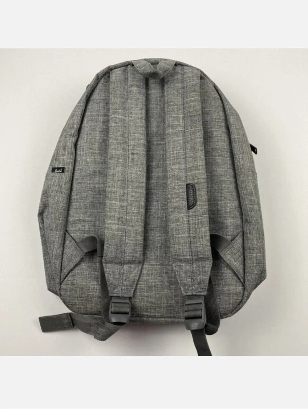 The Herschel Mini Backpack In Grey Color Striped Interior Blk Dots